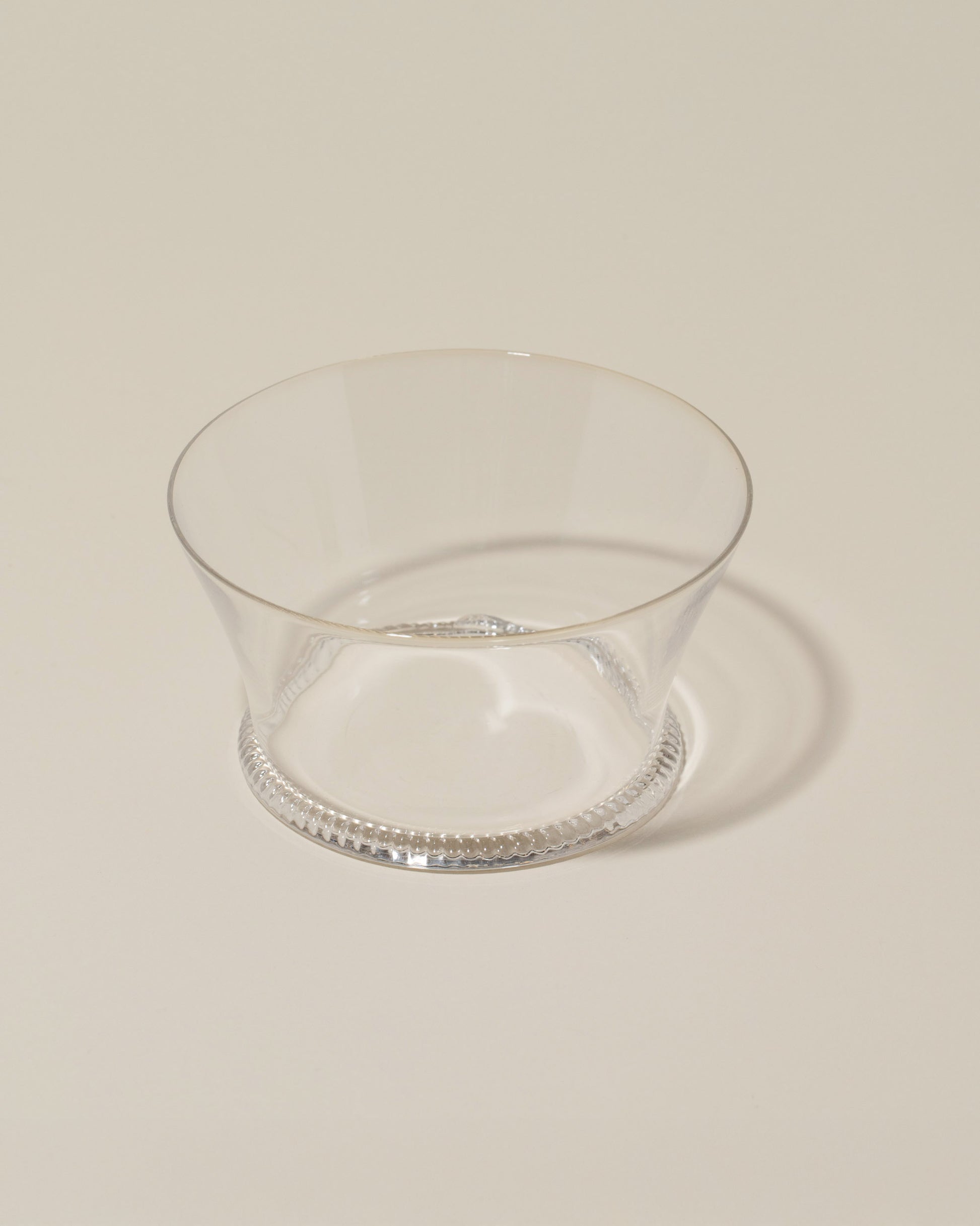 Closeup details of the Bollenglass Design Petite Bowl on light color background.