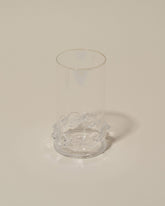 Closeup details of the Bollenglass Design Clear Dot Highball Glass on light color background.