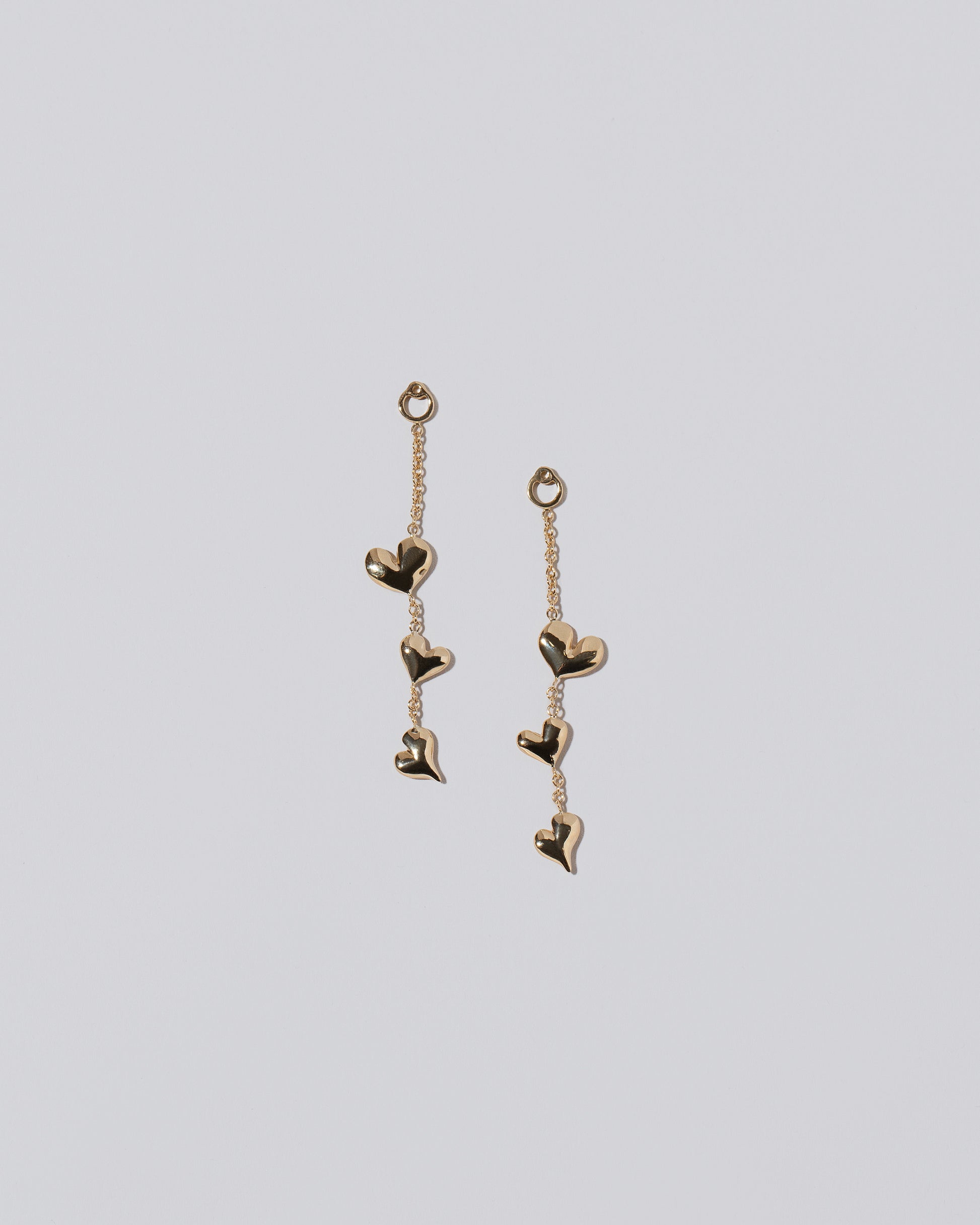 Thousand & One Night Heart Earring Jackets on light color background.