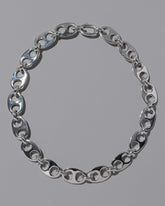 CRZM Sterling Silver Yuba Necklace on light color background.