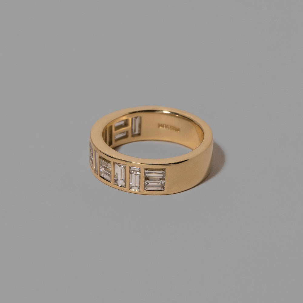 product_details::Closeup details of the Mega Piet Ring on light color background.