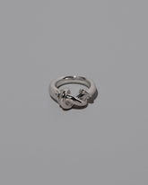 CRZM Sterling Silver Ridge Ring on light color background.