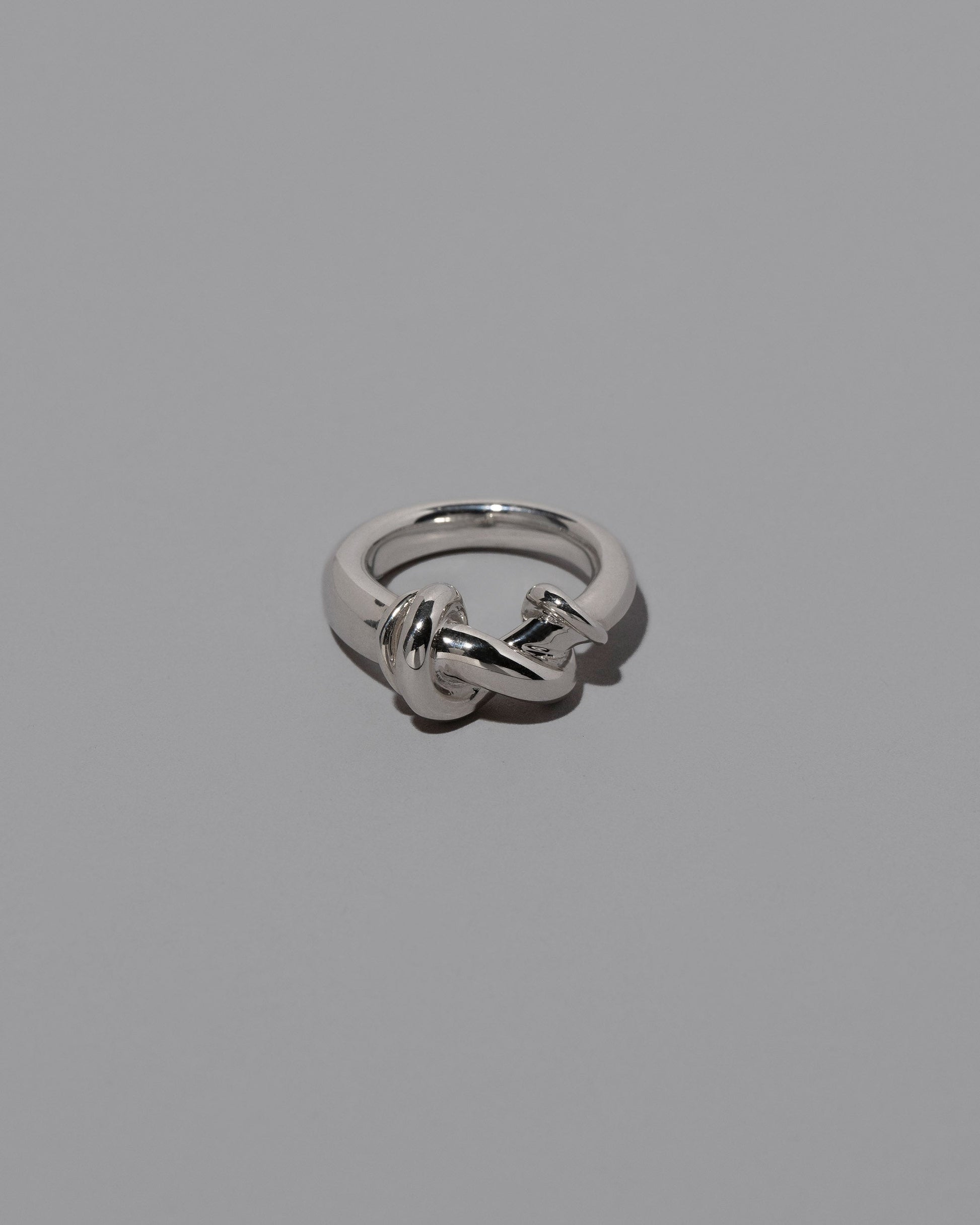 CRZM Sterling Silver Ridge Ring on light color background.