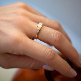 product_details::A past edition of the Gold Diamond Expression Ring on model.