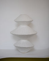 Giselle Hicks Matte White Triple Diamond Vessel on light color background.