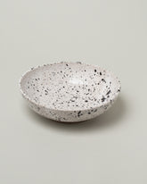 Recreation Center Black Speckle Seven & A Half Inch Everyday Bowl on light color background.