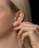Plover Pearl Earrings on model.