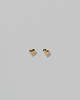 Shape Two Small Thousand & One Night Heart Stud Earrings on light color background.