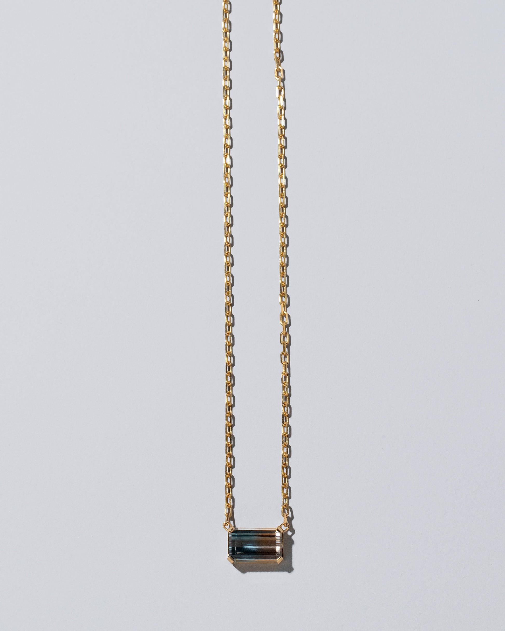 Highest Path Necklace on light color background.