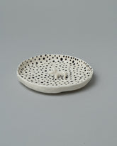 Eleonor Boström One Pup Hanging Dog Dish on light color background.