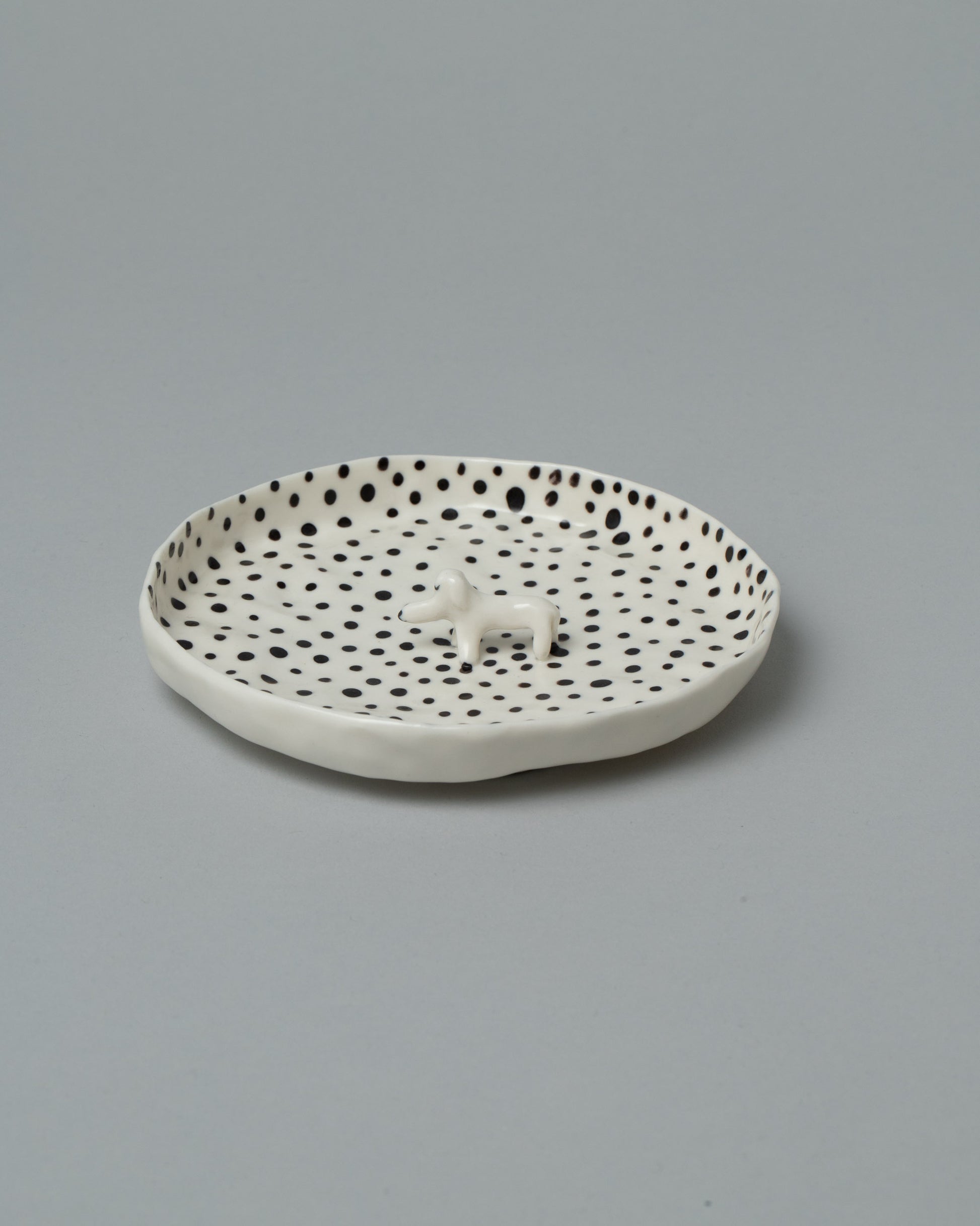 Eleonor Boström One Pup Hanging Dog Dish on light color background.