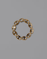 CRZM Gold Yuba Bracelet Medium on light color background.