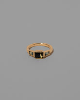 Humanity Ring on light color background.