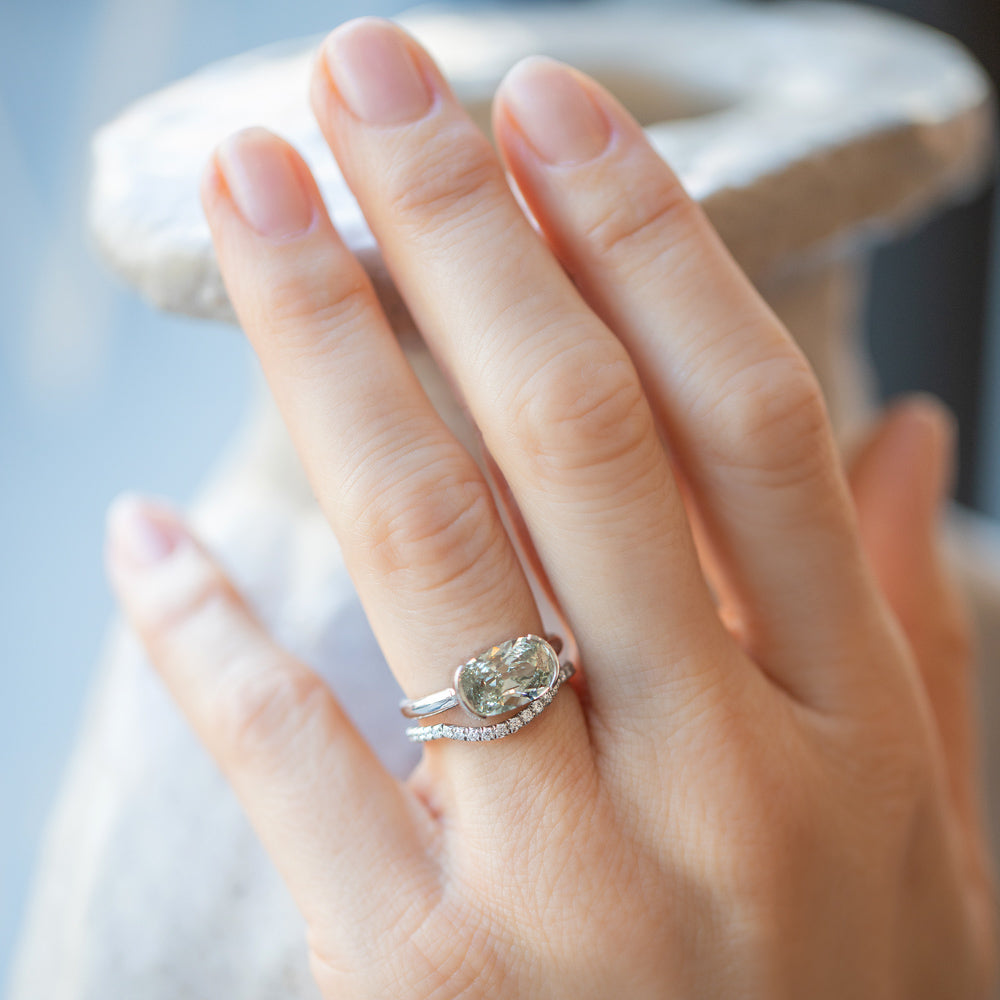 product_details::Shift Ring and Platinum White Diamond Pavé Mini Curve Band stack on model.
