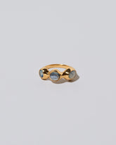 Sword Swallower Ring on light color background.