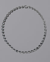CRZM Sterling Silver Mini Bedrock Necklace on light color background.