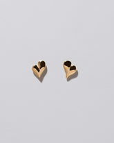 Thousand & One Night Heart Stud Earrings on light color background.