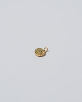 Mini Macaron Charm - Diamond Pavé Pistachio on light color background.