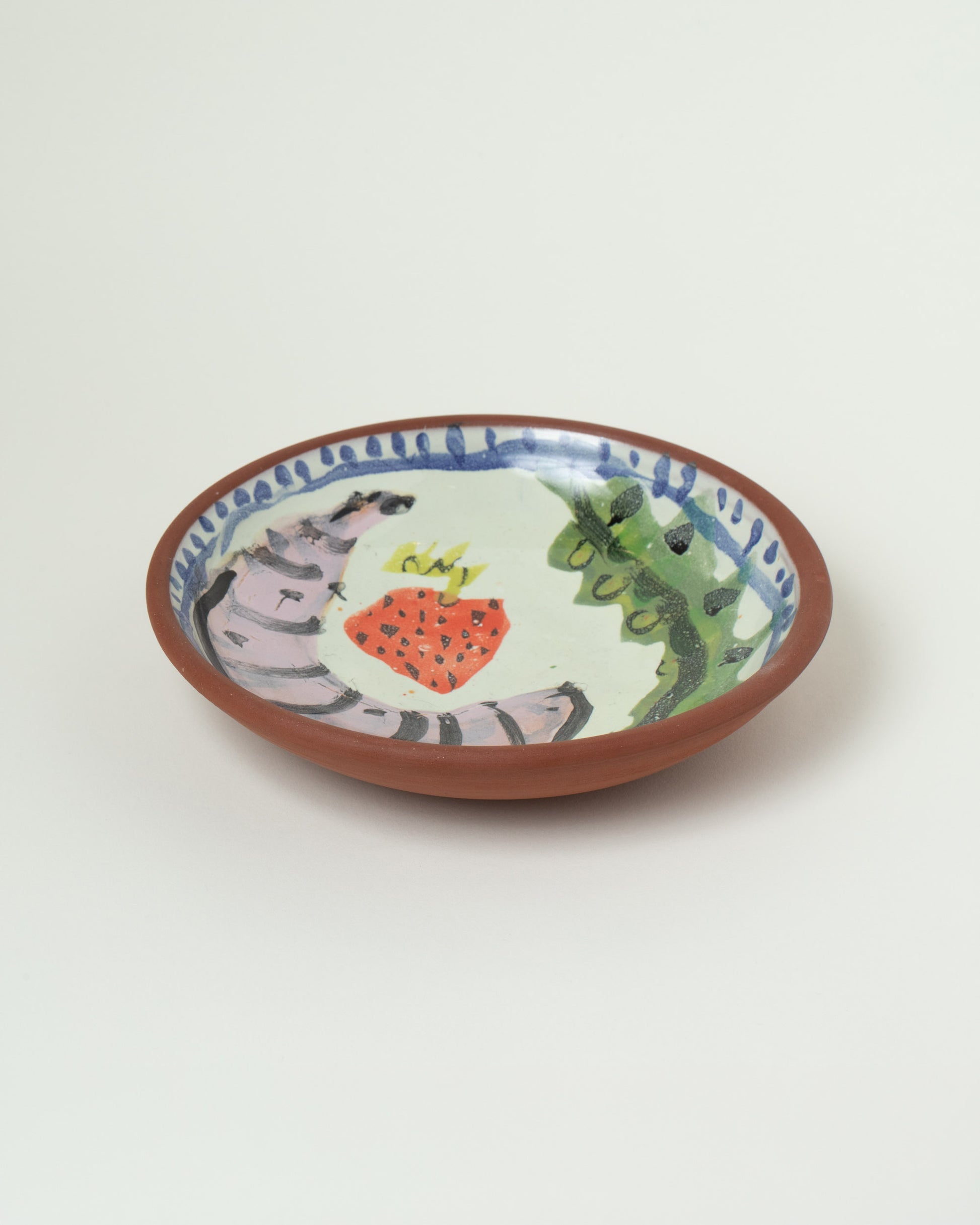 Closeup details of the Maggie Boyd Nine Clay Story Side Bowl on light color background.