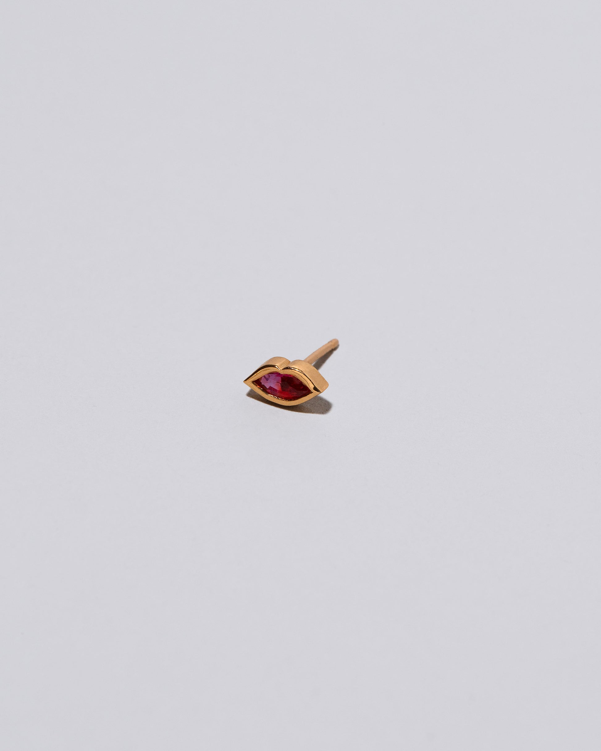 Dark Pink Kiss Stud Earring Single on light color background.