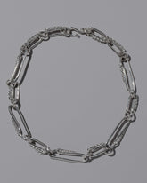 CRZM Sterling Silver Ophiolite Necklace on light color background.