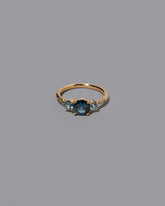 Sapphire Orion Ring on grey color background.