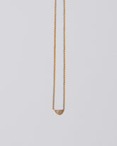 Adamas Necklace on light color background.