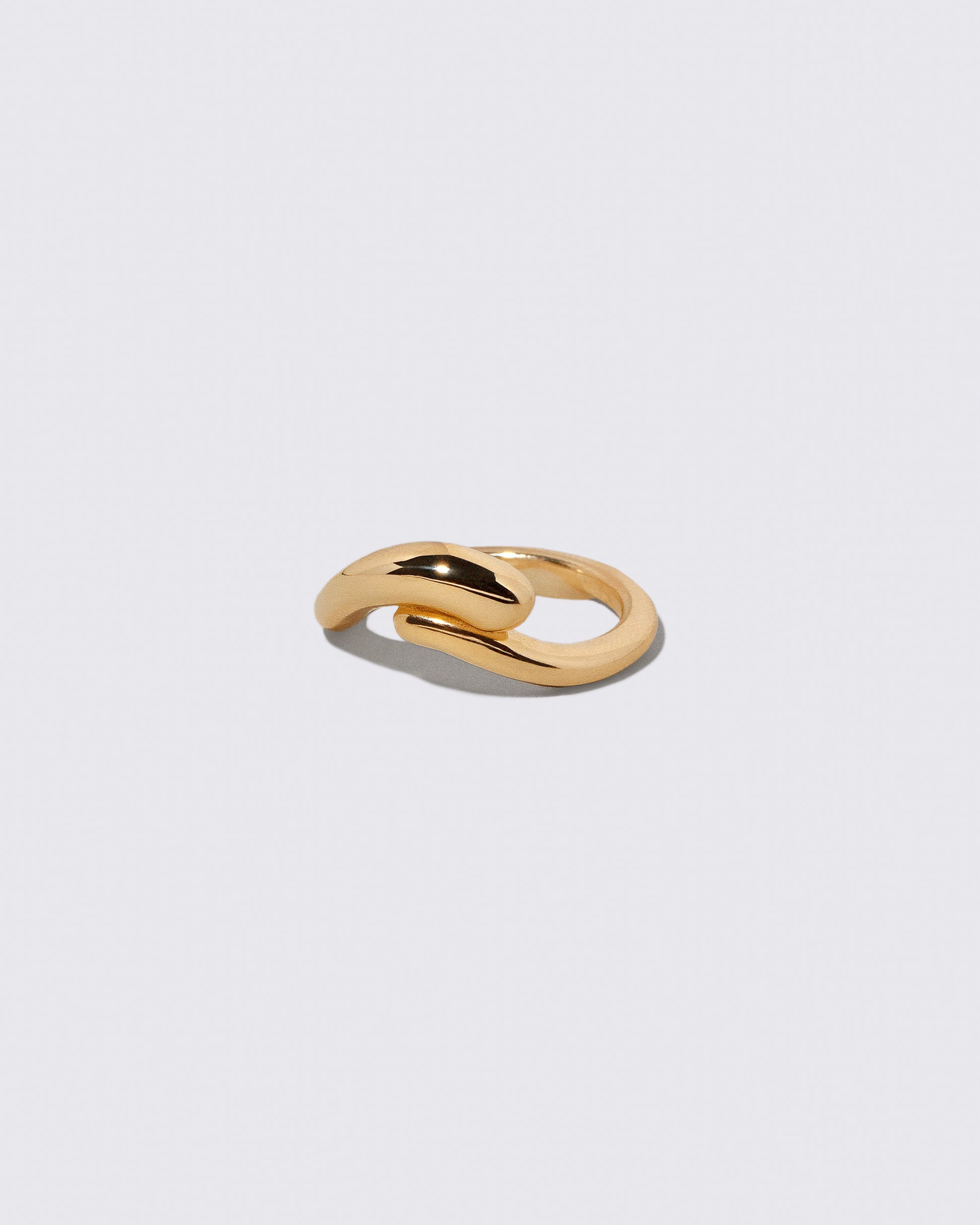 View from the side of the Gold Align Band on light color background.