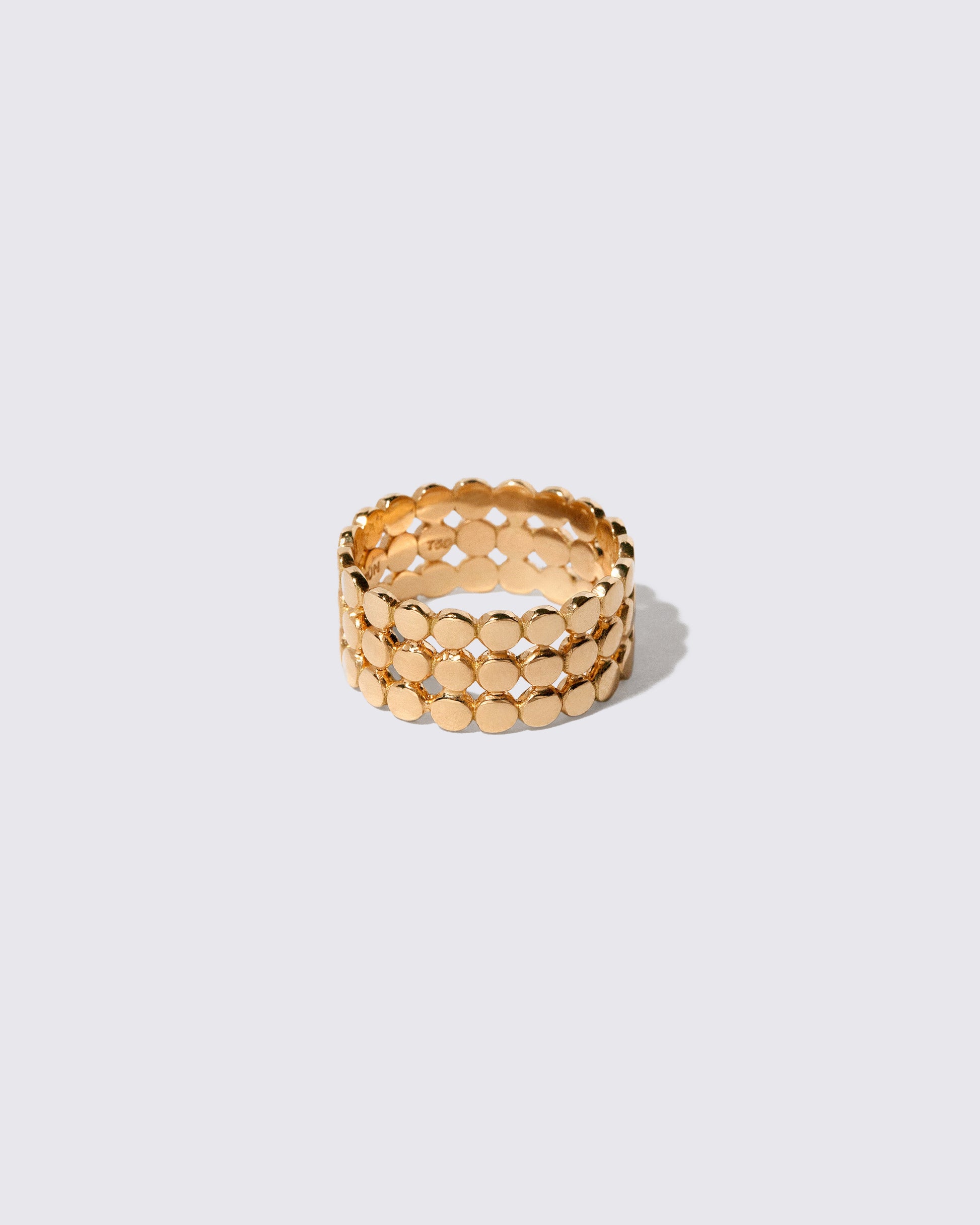 Gold Three Tier Mimosa Band on light color background.