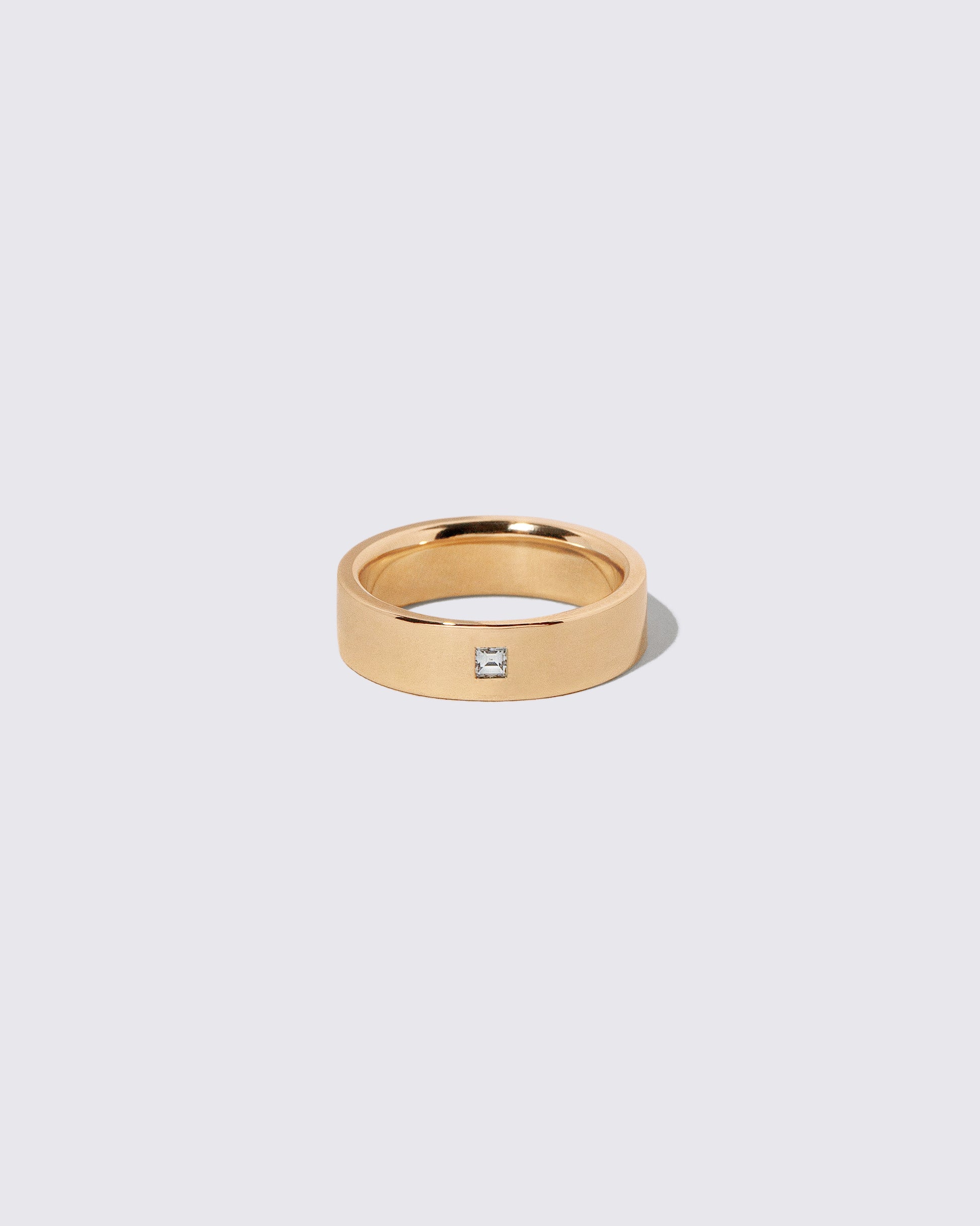 Gold Diamond 6mm Square Cut Piet Band on light color background.