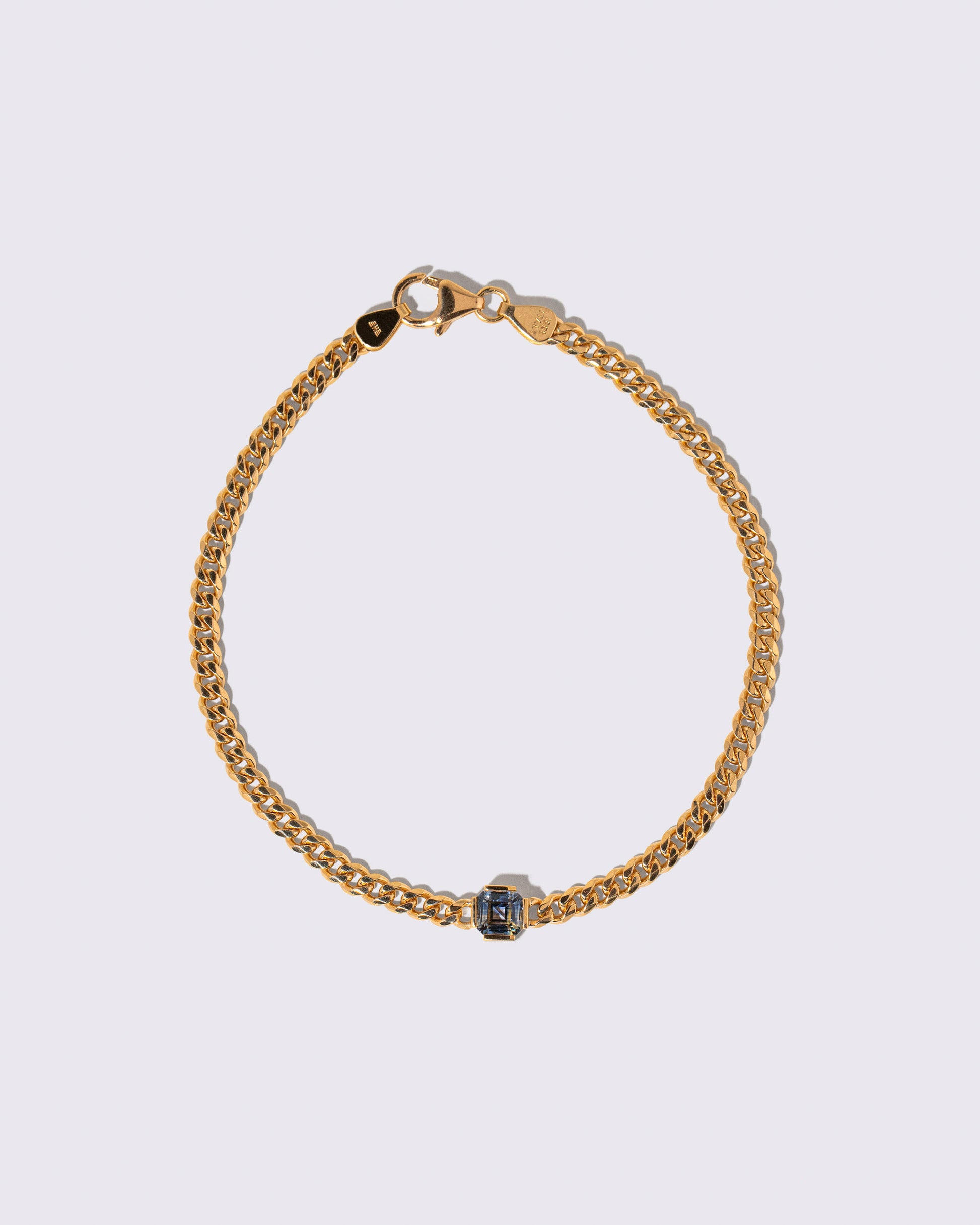 Bicolor Sapphire Fold Bracelet on light color background.