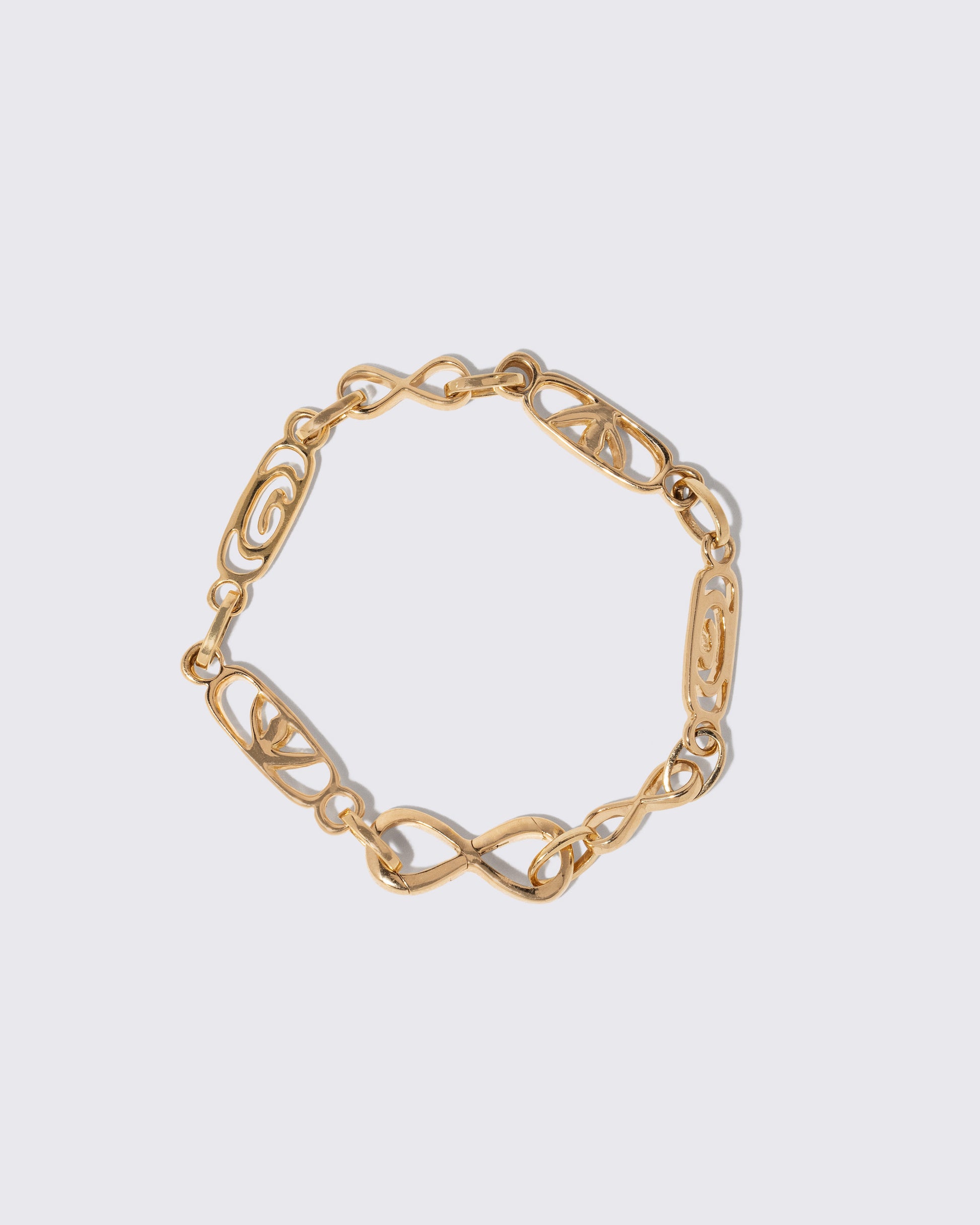 Infinity Openable Link Bracelet on light color background.