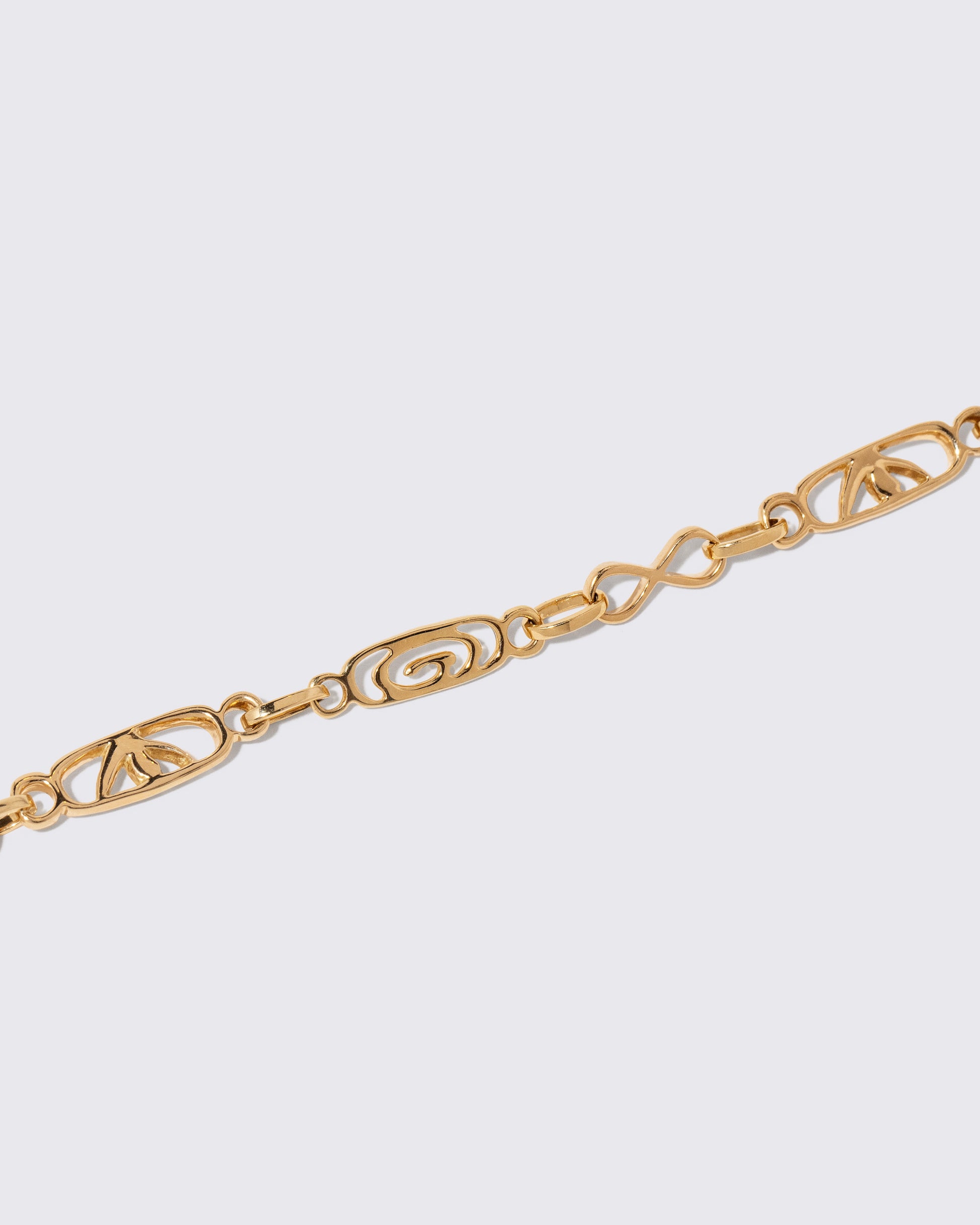 Closeup details of the Infinity Openable Link Bracelet on light color background.