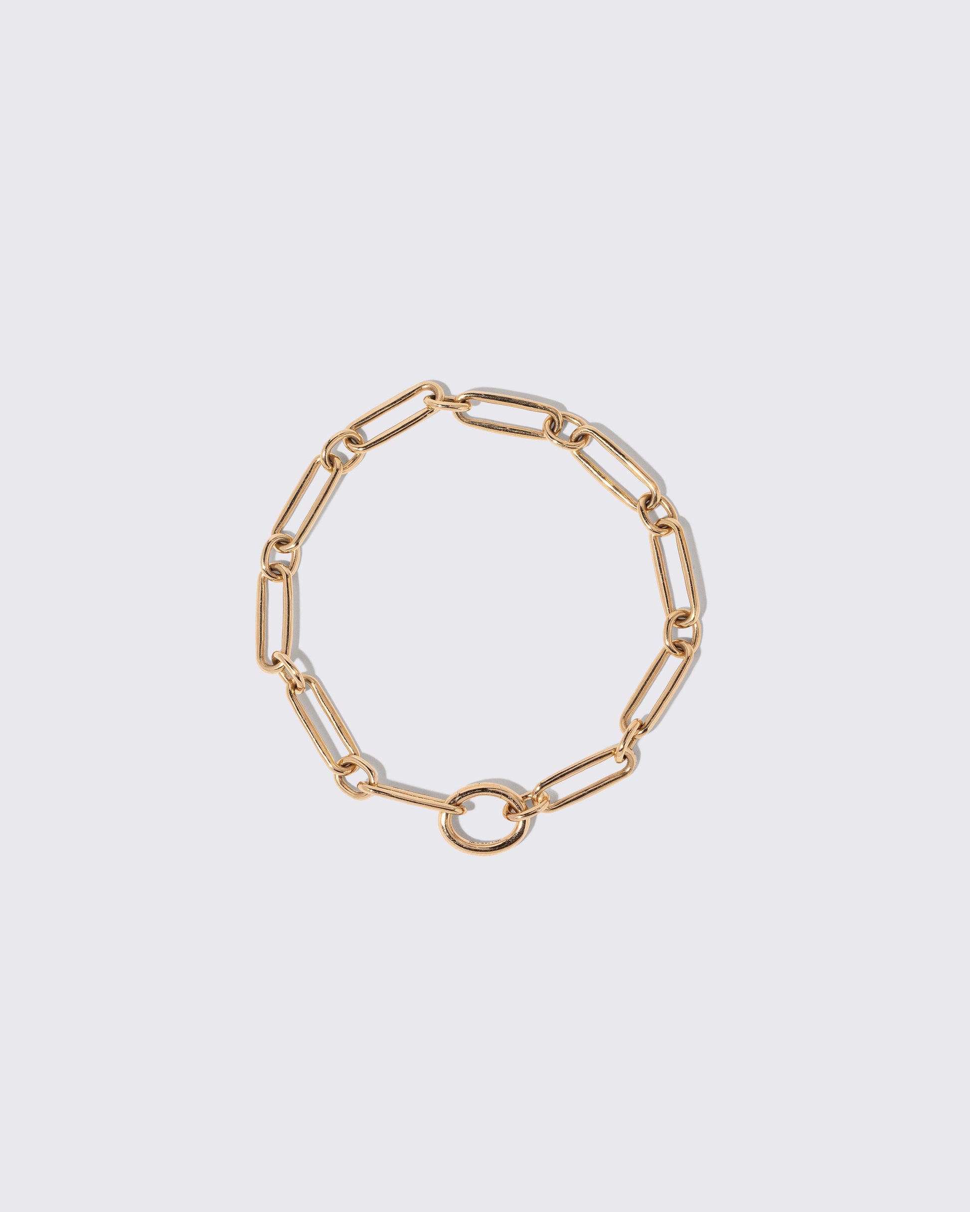 Petite Link Bracelet on light color background.