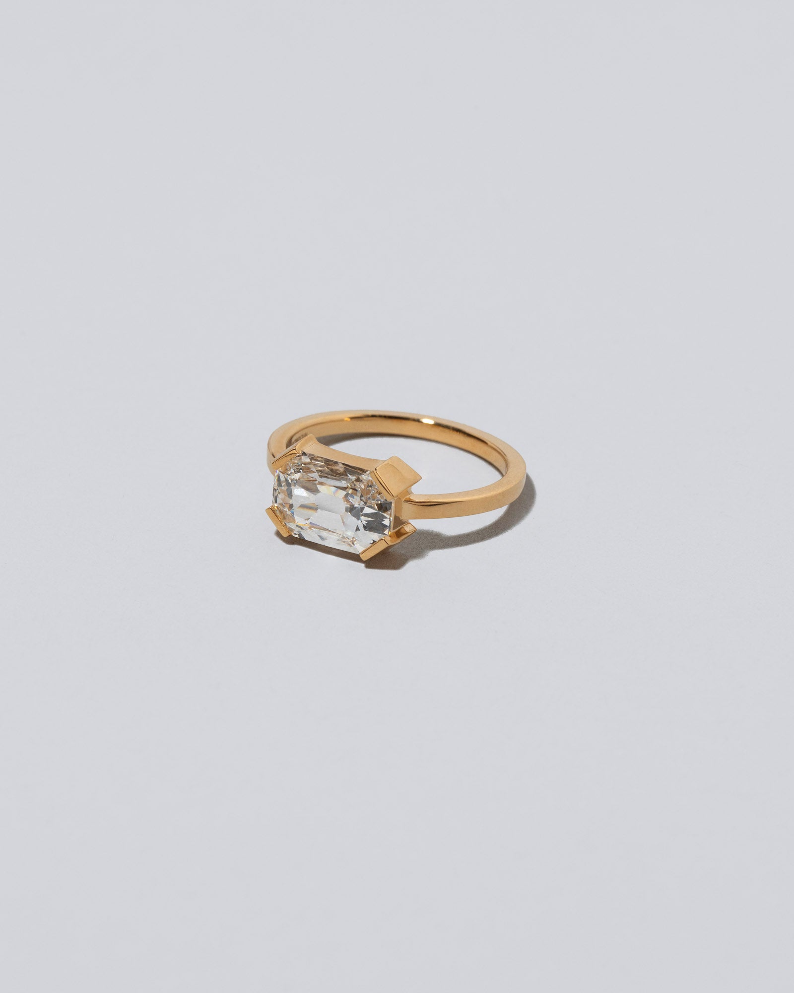 View from the side of the Bright Future Ring on light color background.