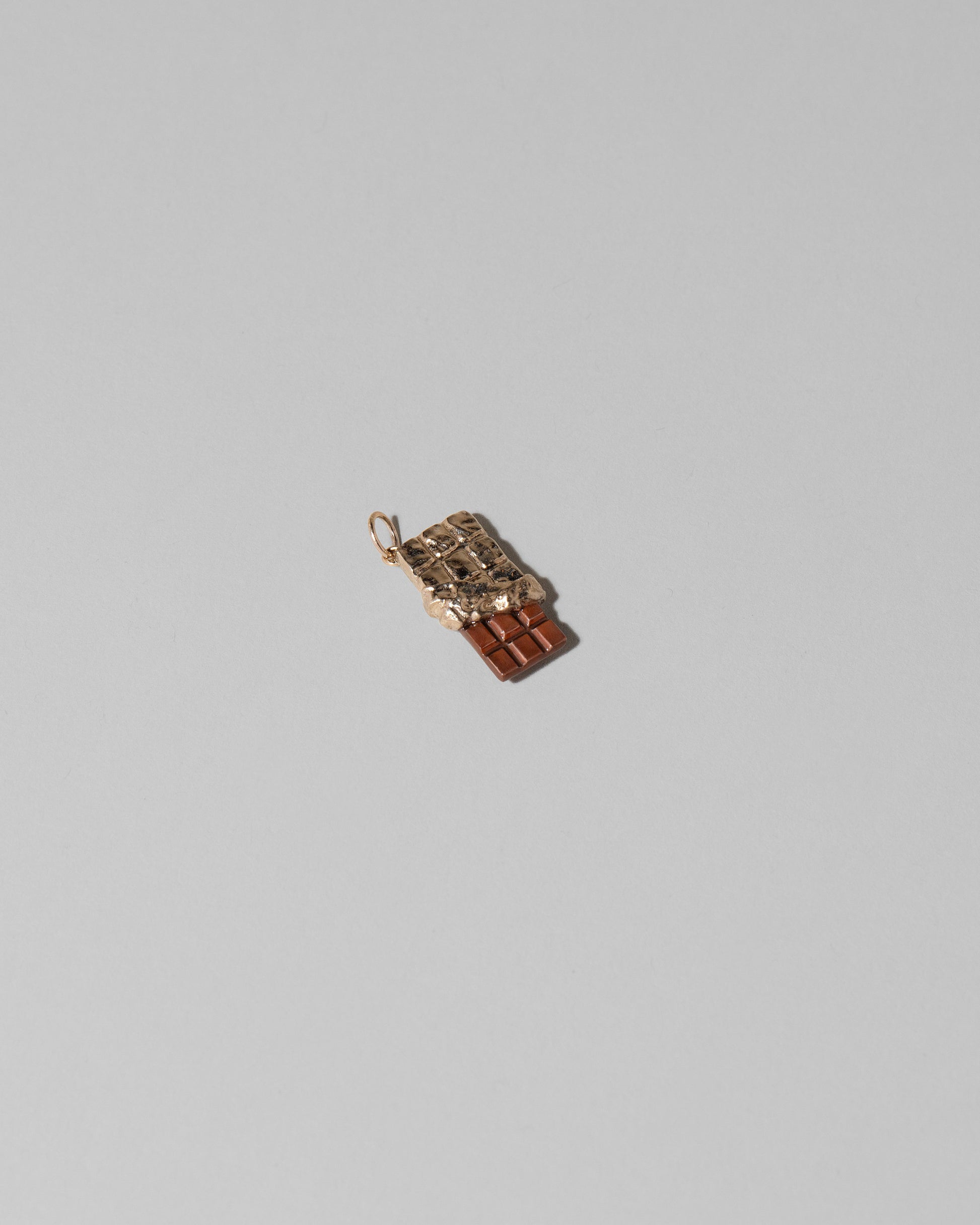 Chocolate Bar Charm on light color background.