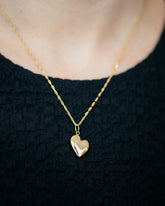 Hot Dog Chain Necklace and Gold Grand Thousand & One Night Heart Charm on model.