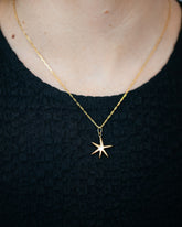 Hot Dog Chain Necklace and Gold Grand Verve Six Point Star Charm on model.