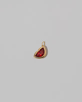Red Lover's Kiss Charm on light color background.