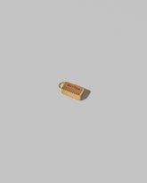 Stick of Unsalted Butter Charm on light color background.