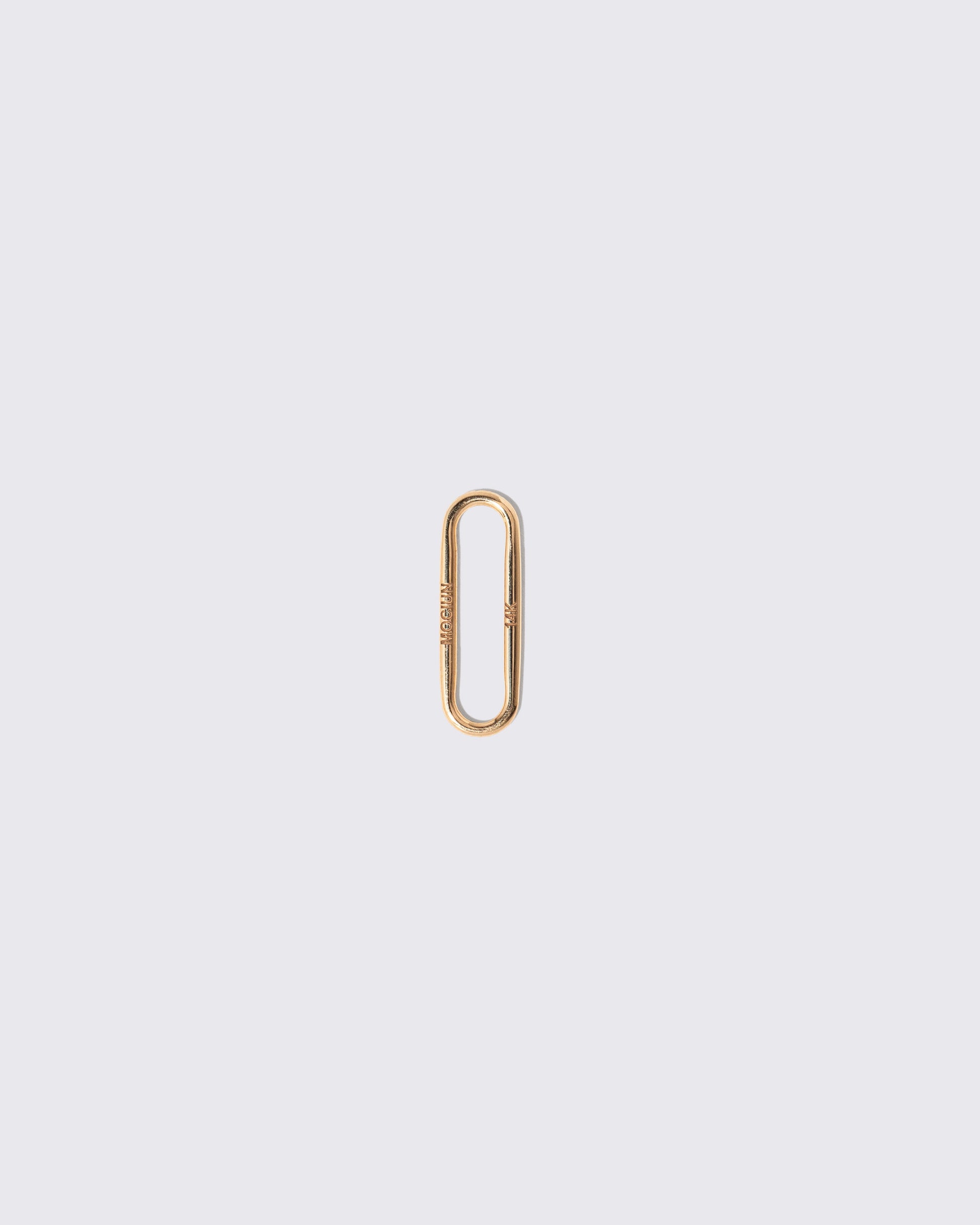 Solid Link Charm on light color background.