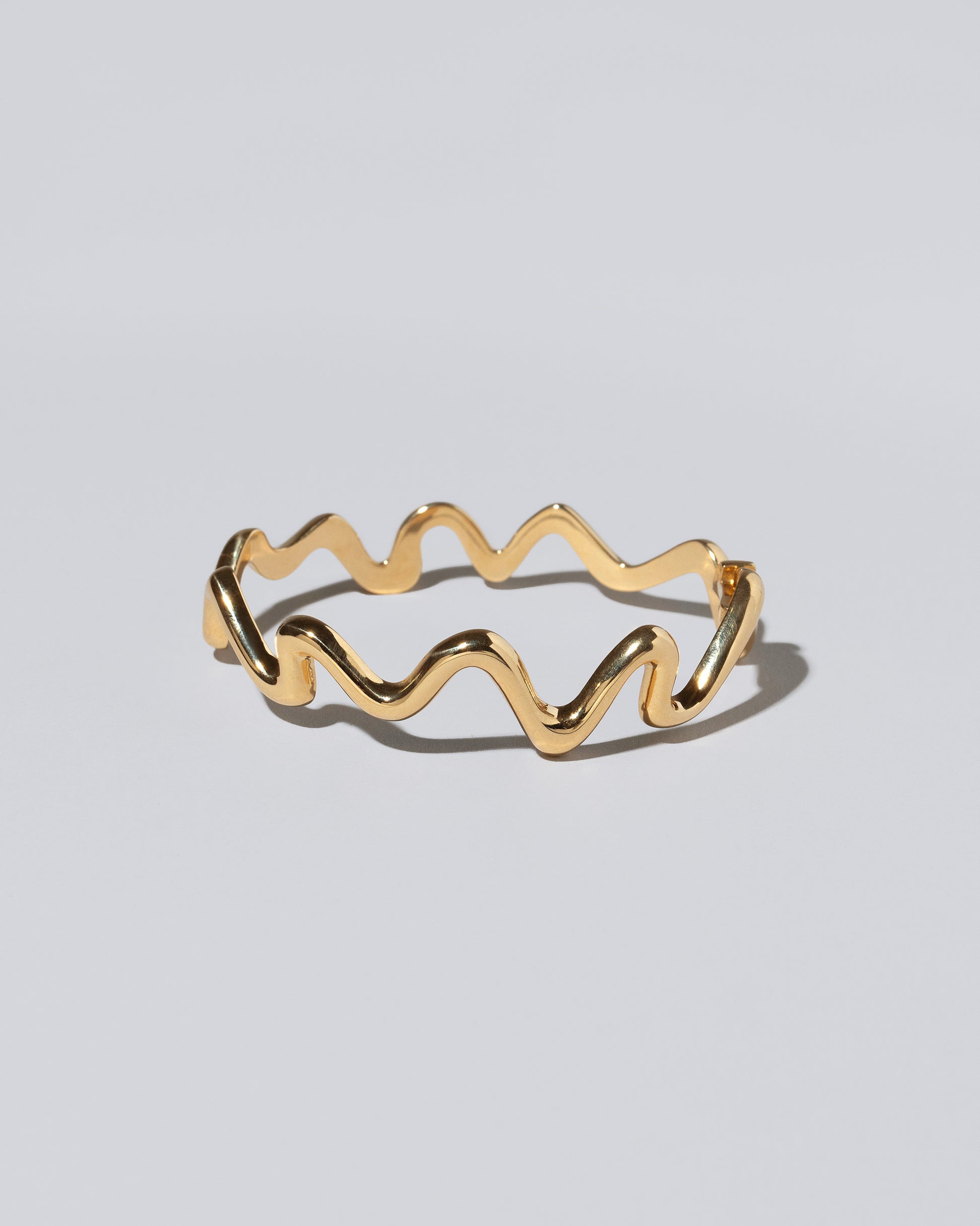 Cut-Outs Bracelet on light color background.