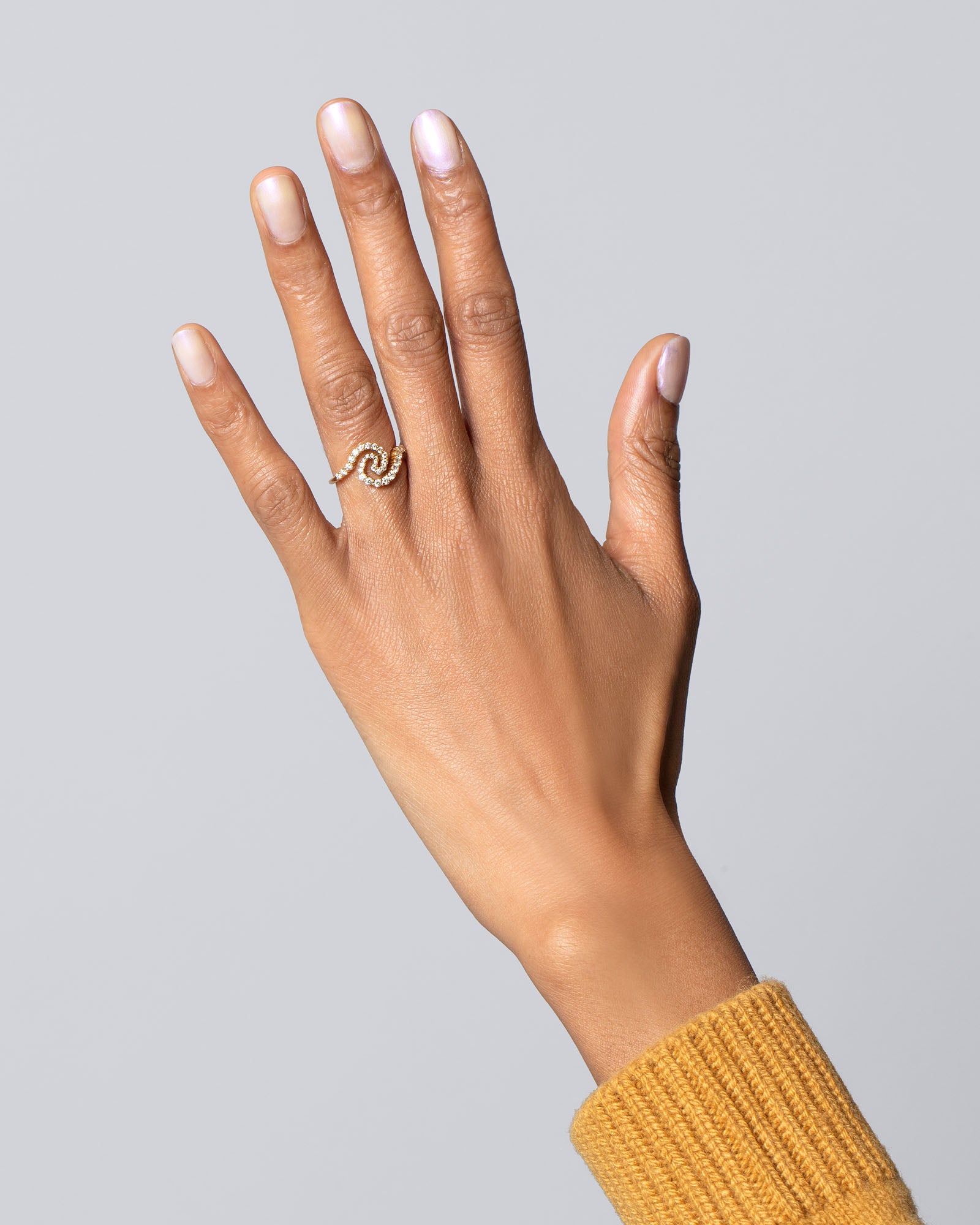 Gold White Diamond Cyclone Ring on model.