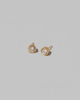 Allium Stud Earrings on light color background.