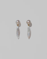 Aphrodite Earrings on light color background.