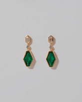 Trillium Earrings on light color background.