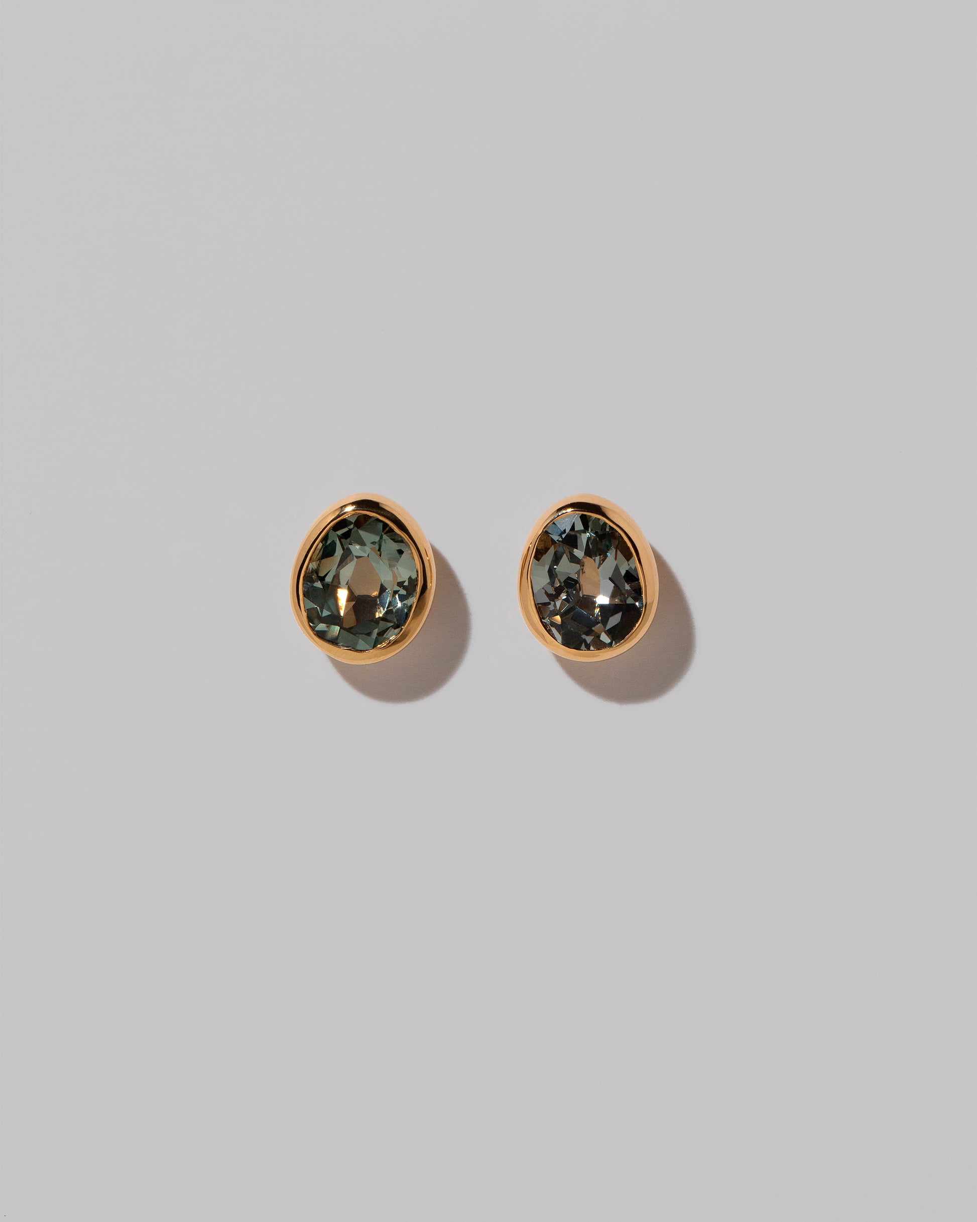 Juniper Studs on light color background.