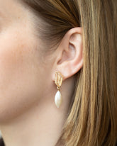 Tricopilia Earrings on model.