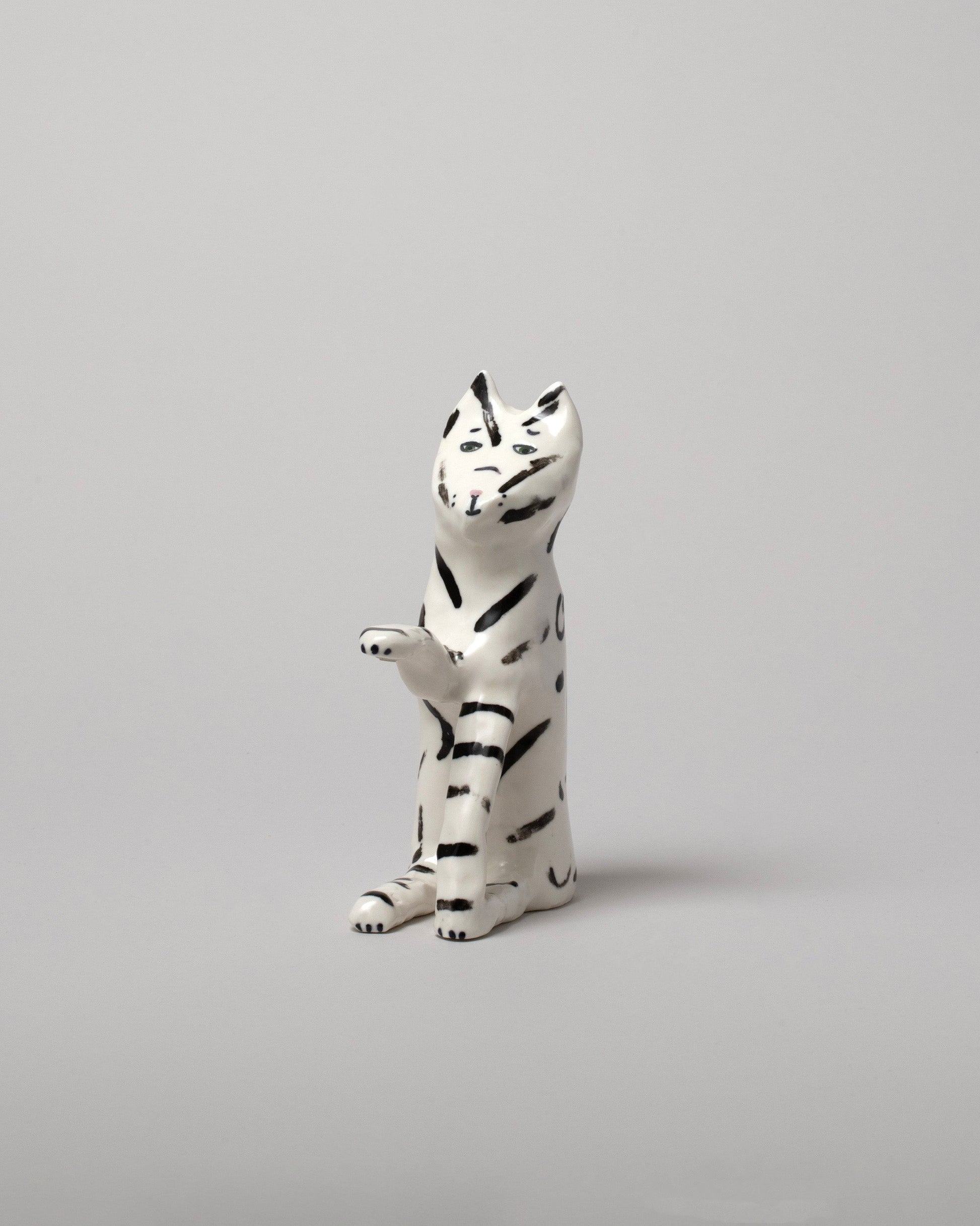 View from the side of the Eleonor Boström Black Key Cat on light color background.
