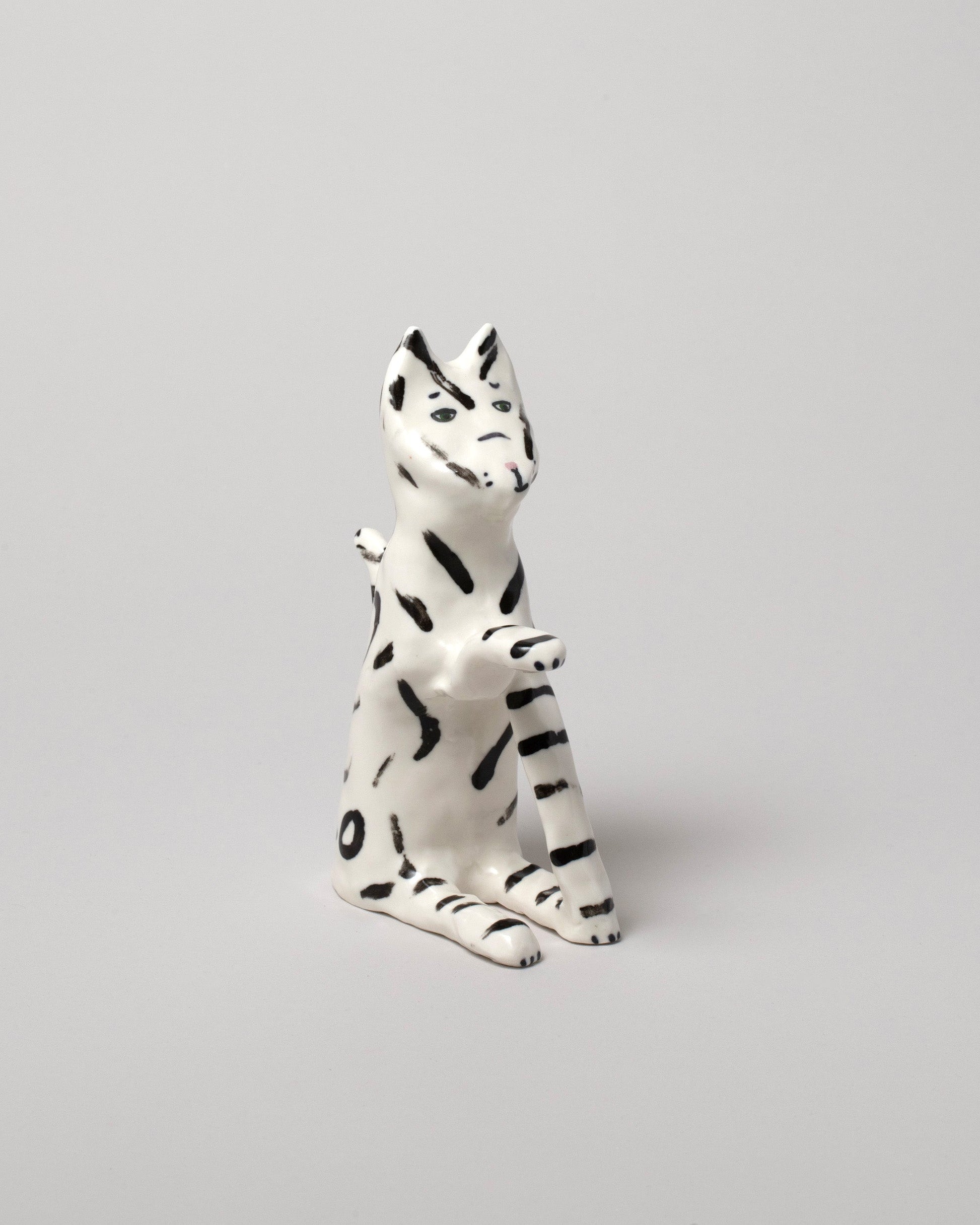 View from the side of the Eleonor Boström Black Key Cat on light color background.